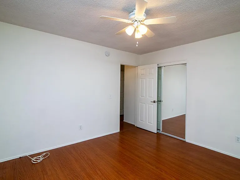 Bedroom #2 with mirror sliding glass doors