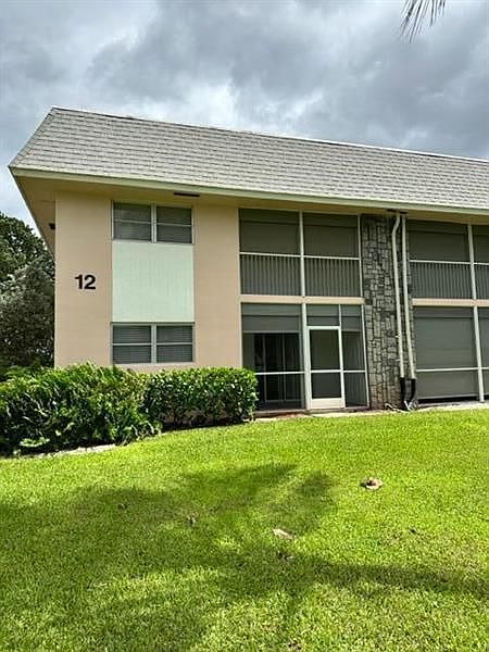 1st image of 18081 SE Country Club Dr APT 115