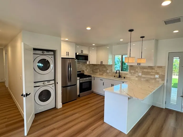 New kitchen with washer and dryer