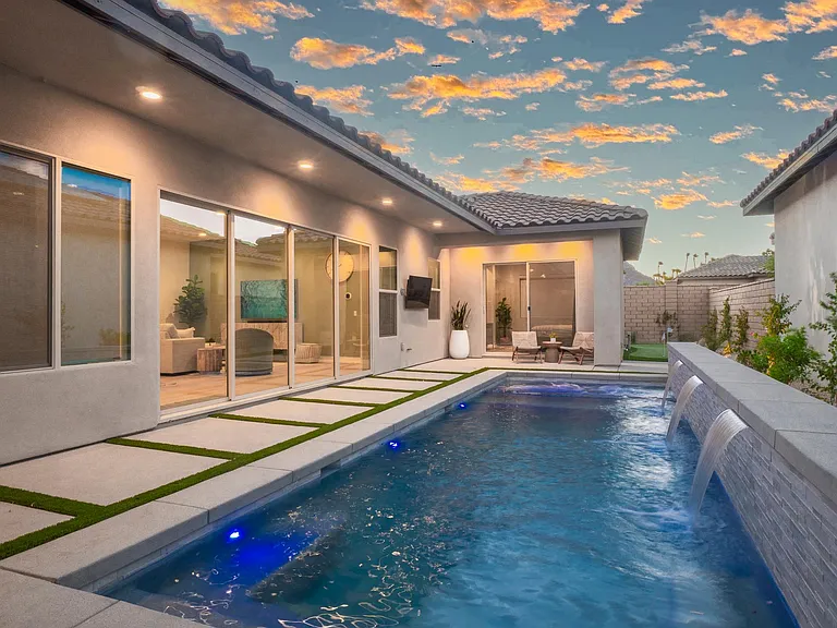 Experience the ultimate luxury at Desert Gem, a 1,901 sq ft. modern 3 bedroom, 3.5 bath property.