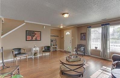 Spacious plenty of room for formal living and engineered hardwood flooring throughout!