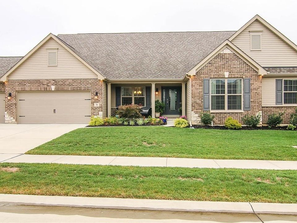 Brick and Stone Waterfall Edge Accent the exterior . . .