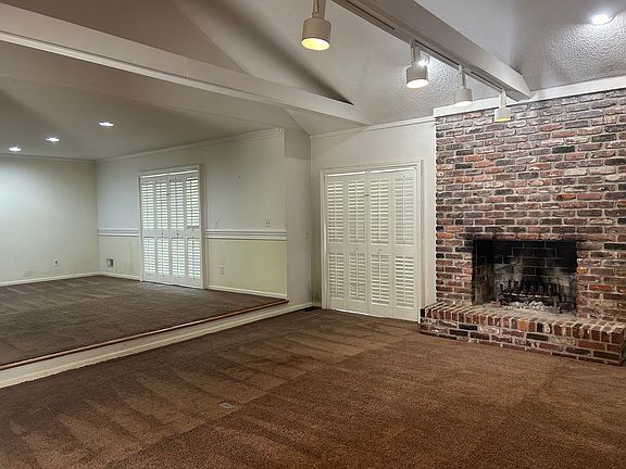 Dining Room or home office and great room with vaulted ceilings