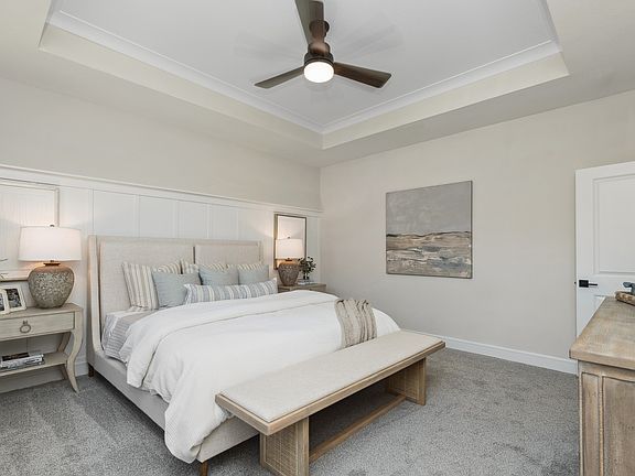 Primary suite with decorative wall