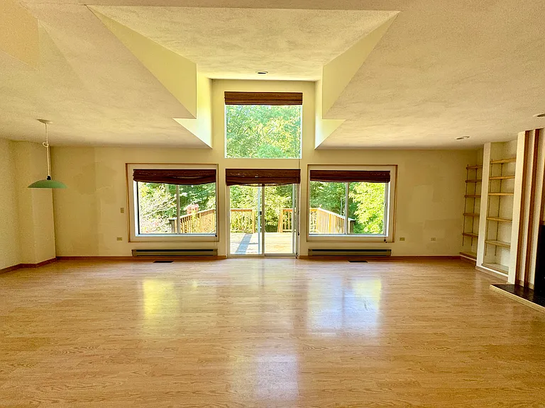 A vaulted ceiling and open floor plan make this a warm and welcoming space