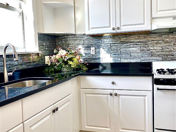 Granite Countertops, decorative tile, new cabinets