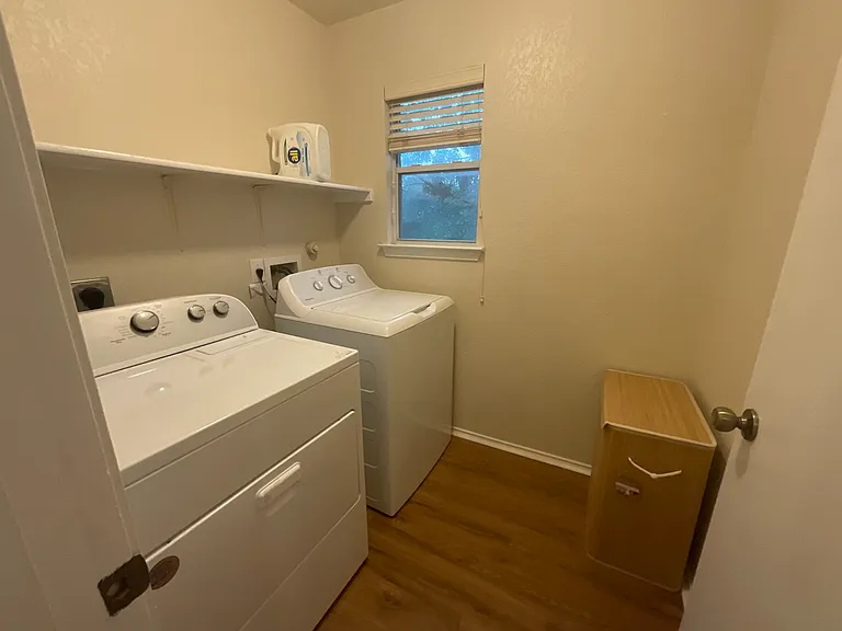 Walk-in full size Washer/Dryer room