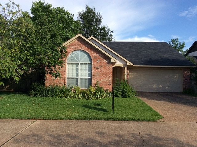 Front view of house. Gated community.