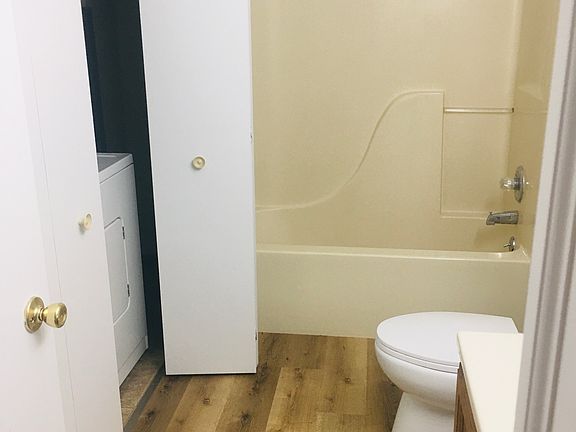 FULL BATHROOM WITH WASHER AND DRYER