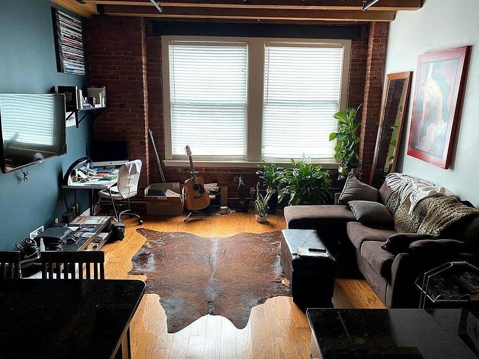 Living room. 2 large windows facing west with unblocked sunset views