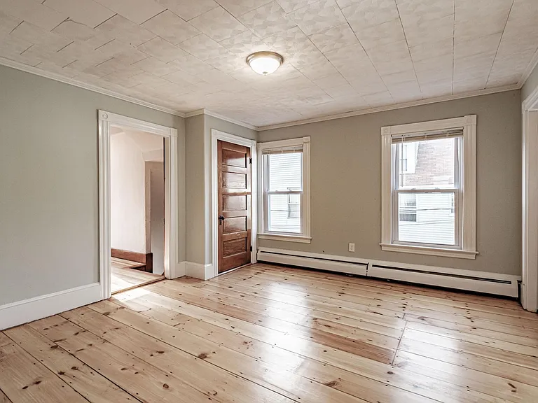Bedroom #1 - at the front of the apartment, 1 door off the entrance hallway and 1 door off the dining room (also a door directly to the bathroom)