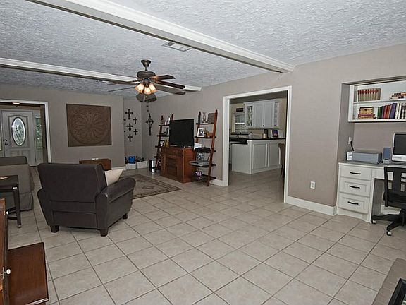 Custom Paint and new title flooring and carpet throughout 1st floor.