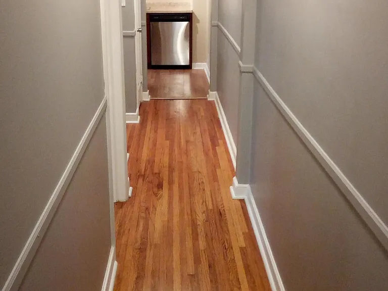 Hallway from kitchen to bedrooms and bathrooms