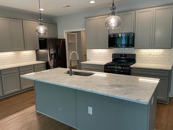 Plenty of counterspace and storage! Black stainless appliances