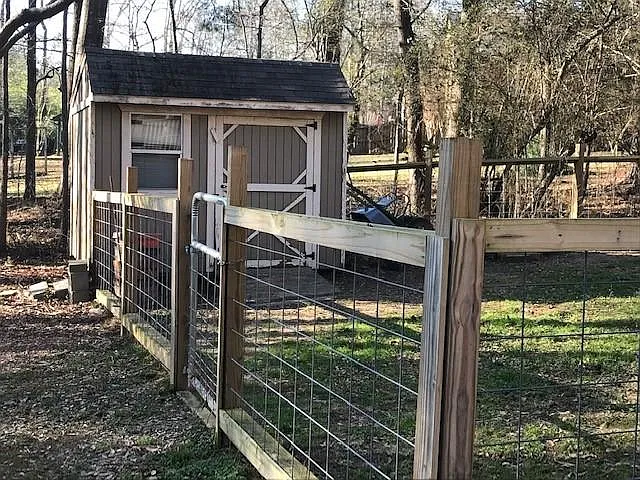 Storage Building and Fenced In Area