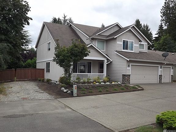 3 car garage & extra parking