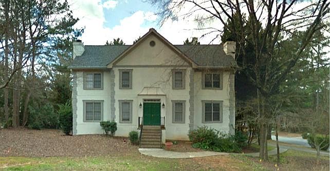 FRONT VIEW, YOU COME IN THE MAIN DOOR AND THERE IS A SMALL FOYER WITH 2 DOORS THE UNIT IS ON THE RIGHT