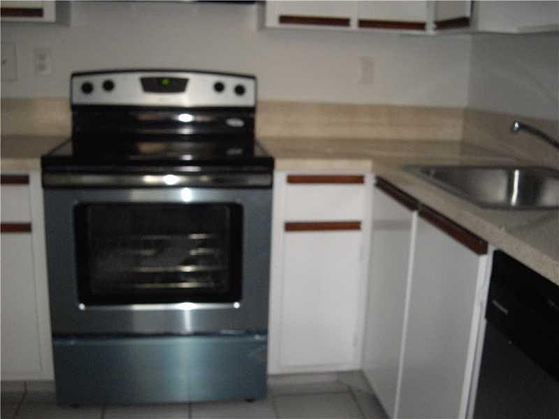 1st image of 704 Gardens Dr APT 104