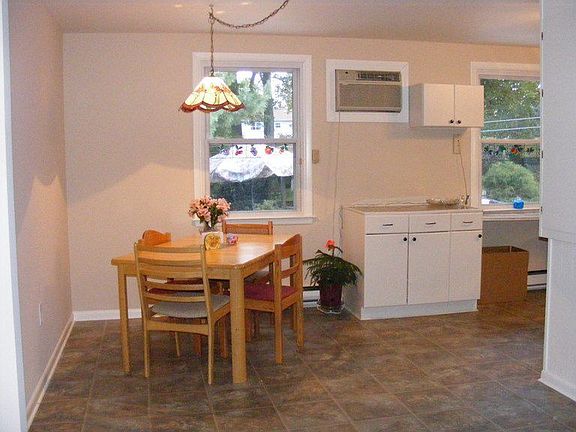 spacious dining area open to kitchen