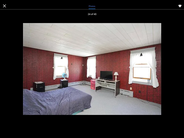 Lots of light and air in this extra-large master bedroom with lots of closet space!