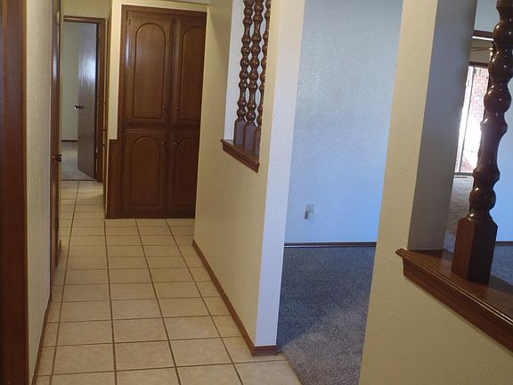 Entry, Front family room to your right, bedroom door to the left, Master bedroom at end of hall. Linen closets halfway back.
