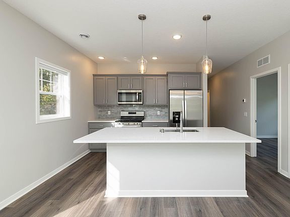 Quartz countertops stainless & appliances