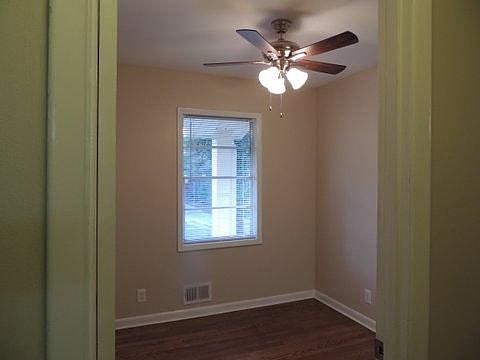 nice foyer with entrance to office area