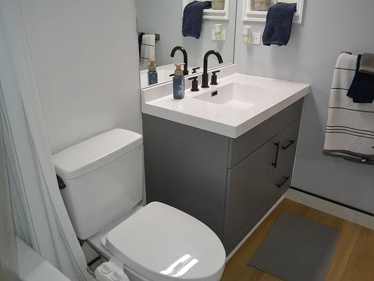 Modern vanity with pull-out drawers, square-top vanity give plenty of storage options