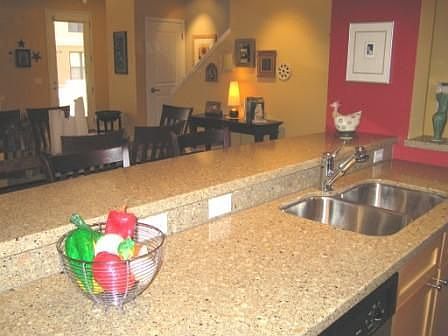Beautiful new Silestone countertops in the kitchen are a luxurious upgrade.