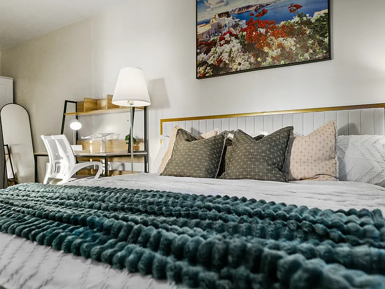 A room designed with a dedicated workspace for productivity and comfort!