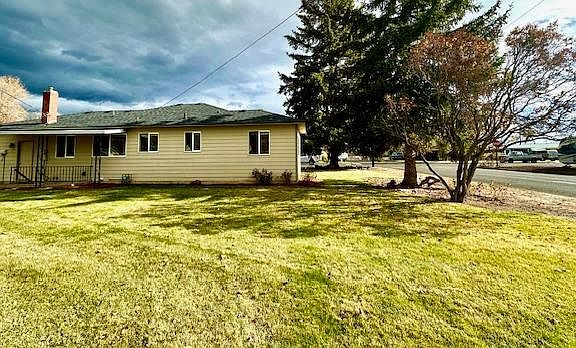 Spacious rear yard shows plenty of off street parking