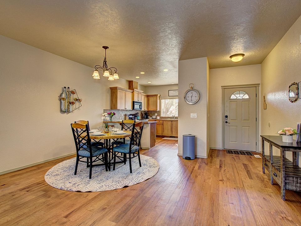 Entry door, dining and kitchen