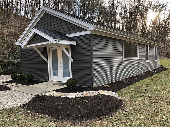 Front Entry of this one level home, experience new home feeling in Anderson Township within Forest Hills School District.