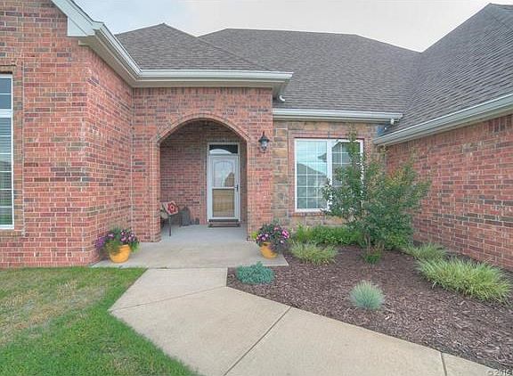Nice front porch with space for a bench or other decor.