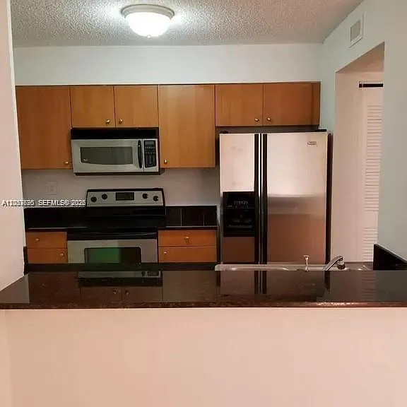 2890 N Oakland Forest Dr #111 — Photo 3