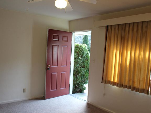Front main entry door facing south. Main entry into the living room.
