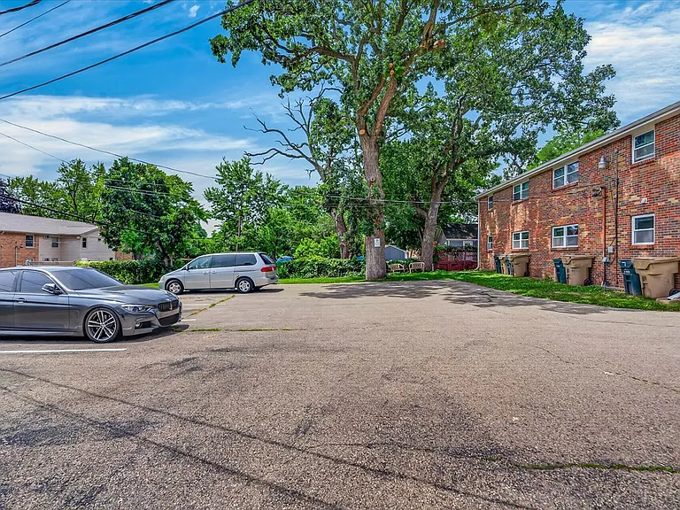 Private lot behind unit; parking stalls are assigned. 1 stall is included with the lease, 1 additional stall available to rent