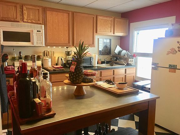 NOT red anymore. It's a creamy beige now.