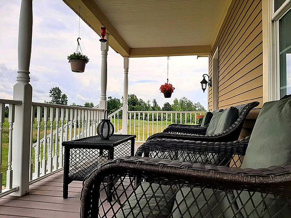 side porch view of woods