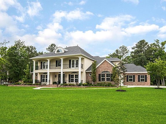 Just picture holiday decor and gatherings with the open air living which includes the large front covered porch, second floor balcony and rear covered porch with it's two story open living area.