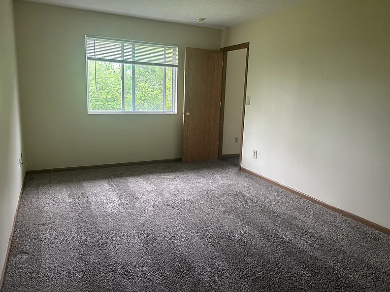 Bedroom located by the dining room