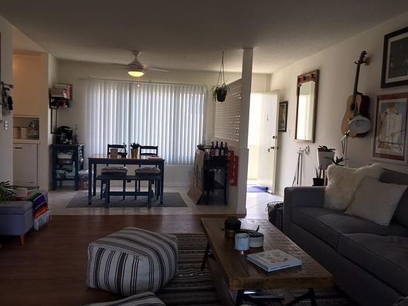 Looking east to dining room and front entry to apartment