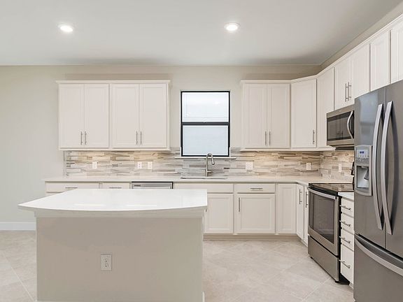 Open Kitchen with optional center island and elegant backsplash
