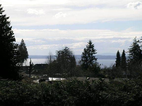 More of the beautiful Western Sound and Olympic views from living room.