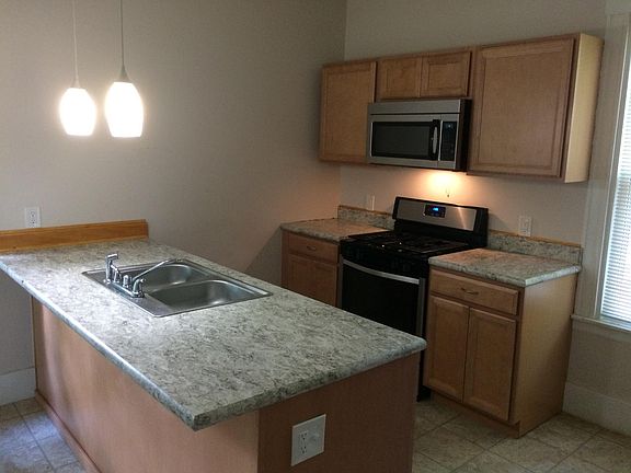 Kitchen with breakfast bar. Dishwasher included. New cabin