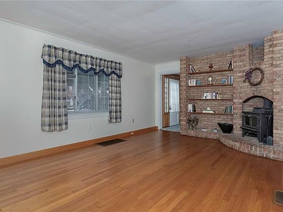 Refinished Hardwood Flooring and Great Natural Light from the Spacious Picture Window