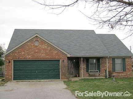 Front From Road
						:
						Sits Back Off Road ; Has 4 Plank Fencing