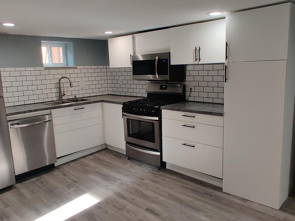 New kitchen with stainless steel appliances