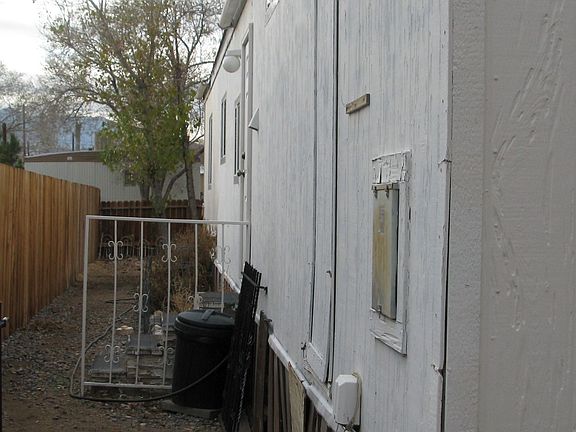 Back left side of 5884 Parker Place