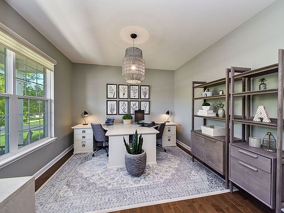 This flex room is currently used as an office, but can also be used as a living room or formal dinin